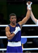 10 August 2016; Gary Russell of USA is declared victorious over Richardson Hitchins of Haiti following their Men's Light Welterweight Preliminary bout at the Riocentro Pavillion 6 Arena during the 2016 Rio Summer Olympic Games in Rio de Janeiro, Brazil. Photo by Stephen McCarthy/Sportsfile