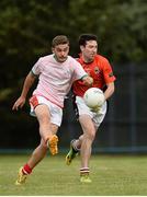 10 August 2016; Peter Hughes of Canada in action against Jimmy Dunleavy of Eire Og San Francisco during the Etihad Airways GAA World Games 2016 - Day 2 at UCD in Dublin. Photo by Sam Barnes/Sportsfile