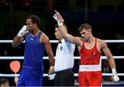 10 August 2016; Mathieu Albert Daniel Bauderlique of France is declared victorious over Juan Carlos Carrillo of Columbia during their Men's Light Heavyweight Preliminary bout at the Riocentro Pavillion 6 Arena during the 2016 Rio Summer Olympic Games in Rio de Janeiro, Brazil. Photo by Stephen McCarthy/Sportsfile