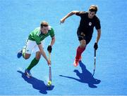 11 August 2016; Jonathan Bell of Ireland in action against Iain Smythe of Canada during the Pool B match between Ireland and Canada at the Olympic Hockey Centre, Deodoro, during the 2016 Rio Summer Olympic Games in Rio de Janeiro, Brazil. Photo by Stephen McCarthy/Sportsfile