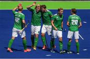 11 August 2016; Shane O'Donoghue, second from left, is congratulated by his Ireland team-mates after scoring his side's second goal during the Pool B match between Ireland and Canada at the Olympic Hockey Centre, Deodoro, during the 2016 Rio Summer Olympic Games in Rio de Janeiro, Brazil. Photo by Stephen McCarthy/Sportsfile