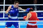 11 August 2016; Steven Donnelly of Ireland, left, in action against Tuvshinbat Byamba of Mongolia during their Welterweight preliminary round of 16 bout in the Riocentro Pavillion 6 Arena, Barra da Tijuca, during the 2016 Rio Summer Olympic Games in Rio de Janeiro, Brazil. Photo by Ramsey Cardy/Sportsfile