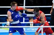 11 August 2016; Steven Donnelly of Ireland, left, in action against Tuvshinbat Byamba of Mongolia during their Welterweight preliminary round of 16 bout in the Riocentro Pavillion 6 Arena, Barra da Tijuca, during the 2016 Rio Summer Olympic Games in Rio de Janeiro, Brazil. Photo by Ramsey Cardy/Sportsfile