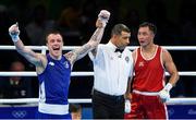 11 August 2016; Steven Donnelly of Ireland, left, is declared victorious over Tuvshinbat Byamba of Mongolia after their Welterweight preliminary round of 16 bout in the Riocentro Pavillion 6 Arena, Barra da Tijuca, during the 2016 Rio Summer Olympic Games in Rio de Janeiro, Brazil. Photo by Ramsey Cardy/Sportsfile