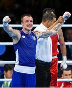 11 August 2016; Steven Donnelly of Ireland celebrates after defeating Tuvshinbat Byamba of Mongolia via split decision in their Welterweight preliminary round of 16 bout in the Riocentro Pavillion 6 Arena, Barra da Tijuca, during the 2016 Rio Summer Olympic Games in Rio de Janeiro, Brazil. Photo by Ramsey Cardy/Sportsfile