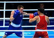 11 August 2016; Steven Donnelly, left, of Ireland in action against Tuvshinbat Byamba of Mongolia during their Welterweight preliminary round of 16 bout in the Riocentro Pavillion 6 Arena, Barra da Tijuca, during the 2016 Rio Summer Olympic Games in Rio de Janeiro, Brazil. Photo by Ramsey Cardy/Sportsfile