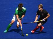 11 August 2016; John Jermyn of Ireland in action against Brenden Bissett of Canada during the Pool B match between Ireland and Canada at the Olympic Hockey Centre, Deodoro, during the 2016 Rio Summer Olympic Games in Rio de Janeiro, Brazil. Photo by Stephen McCarthy/Sportsfile