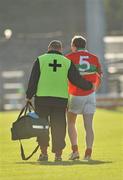 24 October 2010; Steven Byrne, Rathnew, is helped off the field by medical personnel after receiving an injury. AIB GAA Football Leinster Club Senior Championship Quarter-Final, Skyrne v Rathnew, Pairc Tailteann, Navan, Co. Meath. Picture credit: Barry Cregg / SPORTSFILE
