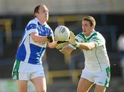 24 October 2010; Brian McCormack, Portlaoise, in action against David Whyte, Moorefield. AIB GAA Football Leinster Club Senior Championship Quarter-Final, Moorefield v Portlaoise, O'Moore Park, Portlaoise, Co. Laois. Picture credit: Stephen McCarthy / SPORTSFILE
