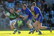 24 October 2010; Colin O'Brien, Nemo Rangers, in action against Michael Shields and Eoin Keane, St Finbarr's. Cork County Senior Football Championship Final, Nemo Rangers v St Finbarr's, Pairc Ui Chaoimh, Cork. Picture credit: Alan Place / SPORTSFILE