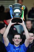 24 September 2010; Coalisland Fianna captain Plunkett Kane lifts the Paddy O'Neill Cup. Tyrone County Senior Football Championship Final, Coalisland Fianna v Carrickmore St Colmcille's, Healy Park, Omagh, Co. Tyrone. Picture credit: Michael Cullen / SPORTSFILE