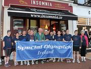 25 October 2010; CEO of Insomnia Bobby Kerr with members of Special Olympics Ireland staff before they set out to compete in the 2010 Lifestyle Sports adidas Dublin City Marathon to help raise awareness and funds for Special Olympics Ireland. Lifestyle Sports - adidas Dublin Marathon 2010, Insomnia, St. Stephens Green, Dublin. Picture credit: Barry Cregg / SPORTSFILE