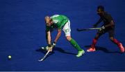 11 August 2016; Conor Harte of Ireland in action against Keegan Pereira of Canada during the Pool B match between Ireland and Canada at the Olympic Hockey Centre, Deodoro, during the 2016 Rio Summer Olympic Games in Rio de Janeiro, Brazil. Photo by Stephen McCarthy/Sportsfile