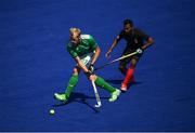 11 August 2016; Conor Harte of Ireland in action against Keegan Pereira of Canada during the Pool B match between Ireland and Canada at the Olympic Hockey Centre, Deodoro, during the 2016 Rio Summer Olympic Games in Rio de Janeiro, Brazil. Photo by Stephen McCarthy/Sportsfile