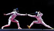 11 August 2016; Irina Embrich of Estonia in action against Tatiana Logunova of Russian Federation during the Women's Épée Team Bronze Medal Match in Carioca Arena 3 during the 2016 Rio Summer Olympic Games in Rio de Janeiro, Brazil. Photo by Ramsey Cardy/Sportsfile