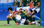 11 August 2016; Yusaku Kuwazuru of Japan scores a try despite the tackle of Juan de Jongh of South Africa during the Men's Rugby Sevens bronze medal match between Japan and South Africa during the 2016 Rio Summer Olympic Games at Deodoro Stadium in Rio de Janeiro, Brazil. Photo by Stephen McCarthy/Sportsfile