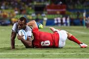 11 August 2016; Osea Kolinisau of Fiji goes over to score his side's first try despite the tackle of Tom Mitchell of Great Britain during the Men's Rugby Sevens gold medal match between Fiji and Great Britain during the 2016 Rio Summer Olympic Games at Deodoro Stadium in Rio de Janeiro, Brazil. Photo by Stephen McCarthy/Sportsfile