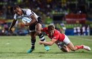 11 August 2016; Osea Kolinisau of Fiji on his way to scoring his side's first try despite the tackle of Tom Mitchell of Great Britain during the Men's Rugby Sevens gold medal match between Fiji and Great Britain during the 2016 Rio Summer Olympic Games at Deodoro Stadium in Rio de Janeiro, Brazil. Photo by Stephen McCarthy/Sportsfile