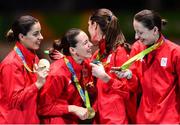 11 August 2016; The Romania team on the podium following their victory in the Women's Épée Team Gold Medal Match in Carioca Arena 3 during the 2016 Rio Summer Olympic Games in Rio de Janeiro, Brazil. Photo by Ramsey Cardy/Sportsfile