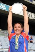 12 August 2016; Captain Erin Clappen of North America lifts the trophy following her side's victory in the GAA World Games Camogie (Native) Final during Day 4 of the Etihad Airways GAA World Games 2016 at Croke Park in Dublin. Photo by Seb Daly/Sportsfile