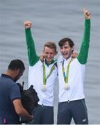 12 August 2016; Paul O'Donovan and Gary O'Donovan of Ireland celebrate with their silver medals after finishing second in the Men's Lightweight Double Sculls A final in Lagoa Stadium, Copacabana, during the 2016 Rio Summer Olympic Games in Rio de Janeiro, Brazil. Photo by Stephen McCarthy/Sportsfile