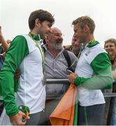 12 August 2016; Paul O'Donovan, left, and Gary O'Donovan of Ireland are congratulated by their father Teddy, centre, after receiving their silver medals in the Men's Lightweight Double Sculls A final in Lagoa Stadium, Copacabana, during the 2016 Rio Summer Olympic Games in Rio de Janeiro, Brazil. Photo by Brendan Moran/Sportsfile