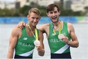 12 August 2016; Paul O'Donovan, right, and Gary O'Donovan of Ireland celebrate with their silver medals after finishing second in the Men's Lightweight Double Sculls A final in Lagoa Stadium, Copacabana, during the 2016 Rio Summer Olympic Games in Rio de Janeiro, Brazil. Photo by Stephen McCarthy/Sportsfile