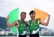 12 August 2016; Paul O'Donovan, right, and Gary O'Donovan of Ireland celebrate with their silver medals after finishing second in the Men's Lightweight Double Sculls A final in Lagoa Stadium, Copacabana, during the 2016 Rio Summer Olympic Games in Rio de Janeiro, Brazil. Photo by Stephen McCarthy/Sportsfile