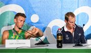 12 August 2016; Gary O'Donovan, left, of Ireland mimically checks his watch for the arrival of Jerome Azou of France for a delayed a press conference after the Men's Lightweight Double Sculls A final in Lagoa Stadium, Copacabana, during the 2016 Rio Summer Olympic Games in Rio de Janeiro, Brazil. Photo by Brendan Moran/Sportsfile