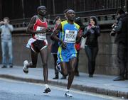 25 October 2010; Mourice Mutinda Musyoki, from Kenya, leads Chesoo Jonathan Kipchirchir, from Kenya, during the Lifestyle Sports - adidas Dublin Marathon 2010, Merrion Square, Dublin. Picture credit: Barry Cregg / SPORTSFILE
