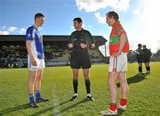 24 October 2010; Aidan Tuite, Skyrne, and Steven Byrne, Rathnew, listen to referee Gary McCormack before he tosses the coin before the game. AIB GAA Football Leinster Club Senior Championship Quarter-Final, Skyrne v Rathnew, Pairc Tailteann, Navan, Co. Meath. Picture credit: Barry Cregg / SPORTSFILE