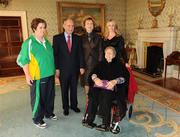 27 October 2010; TEAM Ireland member Linda Cannon, from Athenry, Co. Galway, who won a 4th place ribbon in the Women's 7-aside football at the 2010 Special Olympics European Games, with President Mary McAleese, Dr. Martin McAleese, Kathleen Cannon and Laura Cannon Mullins at a reception to celebrate their achievements in Aras an Uachtarain, Phoenix Park, Dublin. Picture credit: Ray McManus / SPORTSFILE