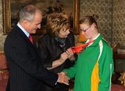 27 October 2010; TEAM Ireland member Nicolle Smith, from Newtownards, Co. Down, who won Gold in the 100 m race, Silver in the 4vx 100 m, and Gold in the long jump, at the 2010 Special Olympics European Games, with President Mary McAleese and Dr. Martin McAleese at a reception to celebrate their achievements in Aras an Uachtarain, Phoenix Park, Dublin. Picture credit: Ray McManus / SPORTSFILE