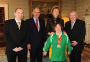 27 October 2010; TEAM Ireland member Cathy Fitzgerald, from Carlow, who won a Silver medal in the softball throw competition and a bronze medal in the 50m race at the 2010 Special Olympics European Games, with President Mary McAleese and Dr. Martin McAleese, alongside Oliver and William Fitzgerald at a reception to celebrate their achievements in Aras an Uachtarain, Phoenix Park, Dublin. Picture credit: Ray McManus / SPORTSFILE
