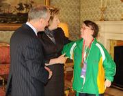 27 October 2010; TEAM Ireland member Bernadette Kennedy, from Gorey, Co Wexford, who won a Bronze medal in the singles badminton event at the 2010 Special Olympics European Games, with President Mary McAleese and Dr. Martin McAleese at a reception to celebrate their achievements in Aras an Uachtarain, Phoenix Park, Dublin. Picture credit: Ray McManus / SPORTSFILE