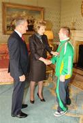 27 October 2010; TEAM Ireland member Riobard Lankford  , from Glasheen Road, Cork, who won Silver in badminton singles and was placed in the badminton doubles event at the 2010 Special Olympics European Games, with President Mary McAleese and Dr. Martin McAleese at a reception to celebrate their achievements in Aras an Uachtarain, Phoenix Park, Dublin. Picture credit: Ray McManus / SPORTSFILE