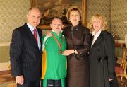 27 October 2010; TEAM Ireland member Riobard Lankford, from Glasheen Road, Cork, who won Silver in badminton singles and was placed in the badminton doubles event at the 2010 Special Olympics European Games, with President Mary McAleese, Dr. Martin McAleese and Noírín Lankford at a reception to celebrate their achievements in Aras an Uachtarain, Phoenix Park, Dublin. Picture credit: Ray McManus / SPORTSFILE