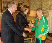 27 October 2010; TEAM Ireland member James Crowe, from Dublin Road, Limerick City, who won who came in 5th place in the bowling doubles event, won a Bronze medal in the singles bowling event and a Gold medal in the bowling team event at the 2010 Special Olympics European Games, with President Mary McAleese and Dr. Martin McAleese at a reception to celebrate their achievements in Aras an Uachtarain, Phoenix Park, Dublin. Picture credit: Ray McManus / SPORTSFILE