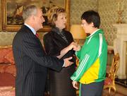 27 October 2010; TEAM Ireland member Karina Houlihan, from Thurles, Co. Tipperary, who earned a 4th place ribbon  in the Women’s 7-aside football at the 2010 Special Olympics European Games, with President Mary McAleese and Dr. Martin McAleese at a reception to celebrate their achievements in Aras an Uachtarain, Phoenix Park, Dublin. Picture credit: Ray McManus / SPORTSFILE