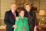 27 October 2010; TEAM Ireland member Kim Byrne, member of CWCW Enniscorthy, Co. Wexford, who earned a 4th place ribbon  in the Women’s 7-aside football at the 2010 Special Olympics European Games, with President Mary McAleese and Dr. Martin McAleese at a reception to celebrate their achievements in Aras an Uachtarain, Phoenix Park, Dublin. Picture credit: Ray McManus / SPORTSFILE
