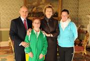 27 October 2010; TEAM Ireland member Catherine McCarthy, from Thurles, Co. Tipperary, who earned a 4th place ribbon  in the Women’s 7-aside football at the 2010 Special Olympics European Games, with President Mary McAleese, Dr. Martin McAleese and Louise O'Toole at a reception to celebrate their achievements in Aras an Uachtarain, Phoenix Park, Dublin. Picture credit: Ray McManus / SPORTSFILE