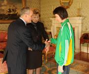 27 October 2010; TEAM Ireland member Fionnuala Treacy, from Ballinasloe, Co. Galway, who earned a 4th place ribbon  in the Women’s 7-aside football at the 2010 Special Olympics European Games, with President Mary McAleese and Dr. Martin McAleese at a reception to celebrate their achievements in Aras an Uachtarain, Phoenix Park, Dublin. Picture credit: Ray McManus / SPORTSFILE