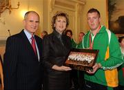 27 October 2010; TEAM Ireland member Philip Patton, from Dromore, Co. Down, who won a Bronze in Table Tennis doubles, and came 7th place in table tennis singles at the 2010 Special Olympics European Games, presents President Mary McAleese and Dr. Martin McAleese with a picture at a reception to celebrate their achievements in Aras an Uachtarain, Phoenix Park, Dublin. Picture credit: Ray McManus / SPORTSFILE