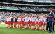 26 September 2010; The Tyrone team stand for the national anthem before the game. TG4 All-Ireland Senior Ladies Football Championship Final, Dublin v Tyrone, Croke Park, Dublin. Picture credit: Brendan Moran / SPORTSFILE