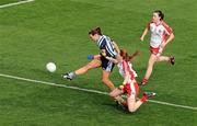 26 September 2010; Elaine Kelly, Dublin, in action against Sarah Donnelly and Maria Donnelly, right, Tyrone. TG4 All-Ireland Senior Ladies Football Championship Final, Dublin v Tyrone, Croke Park, Dublin. Picture credit: Brendan Moran / SPORTSFILE