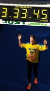 25 October 2010; Kimmo Niva, from Sweden, celebrates completing the Lifestyle Sports - adidas Dublin Marathon 2010. Dublin. Picture credit: Stephen McCarthy / SPORTSFILE