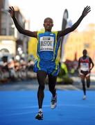 25 October 2010; Mourice Mutinda Musyoki, from Kenya, celebrates finishing third, in a time of 2:10:25, during the Lifestyle Sports - adidas Dublin Marathon 2010. Dublin. Picture credit: Stephen McCarthy / SPORTSFILE