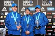 25 October 2010; Women's winner Tatiana Aryasova, Russia, who won in a record time of 2:26:13, centre, with second place Kateryna Stetsenko, Ukraine, right, and Elsa Kireeva, from Russia, at the Lifestyle Sports - adidas Dublin Marathon 2010. Dublin. Picture credit: Stephen McCarthy / SPORTSFILE