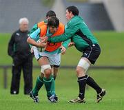 29 October 2010; Ireland's Donnacha O'Callaghan is tackled by Paddy Butler during squad training ahead of their Autumn International game against South Africa on November the 6th. Ireland Rugby Squad Training, University of Limerick, Limerick. Picture credit: Matt Browne / SPORTSFILE