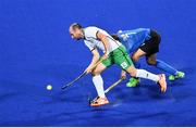 12 August 2016; Peter Caruth of Ireland in action against Facundo Callioni of Argentina during the Pool B match between Ireland and Argentina at the Olympic Hockey Centre, Deodoro, during the 2016 Rio Summer Olympic Games in Rio de Janeiro, Brazil. Photo by Stephen McCarthy/Sportsfile